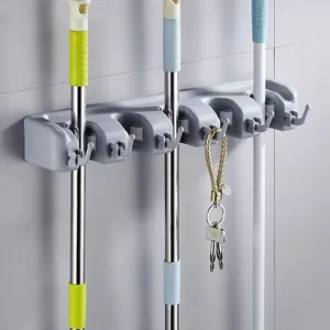 GripMasterâ¢ Pro High-Quality Broom & Mop Holder, BROOM STICK AND MOP HOLDER, 5 LAYER BROOM STICK ORGANIZER, WALL MOUNT ORGANIZERS